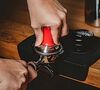 Baristator high-precision 58.6mm tamper with red wooden handle image number 1