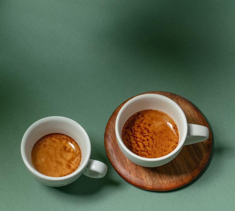 two espresso cups with a smooth, golden crema