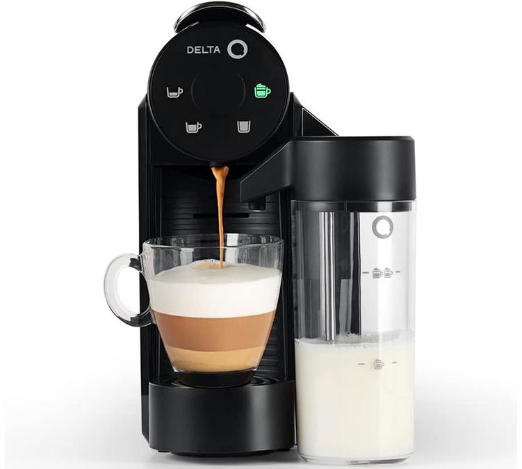 cafetiere mini milk qool de delta q : une machine a spaule qui propose du lait onctueux